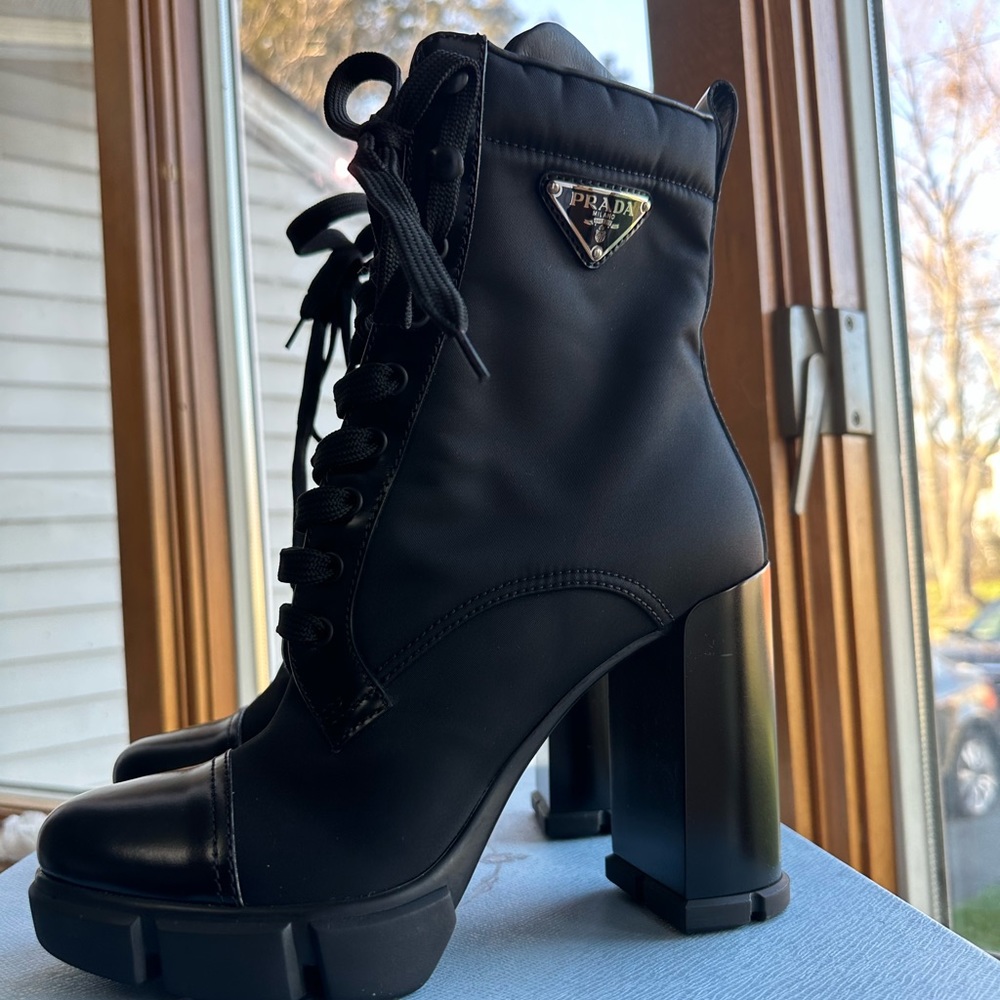Brushed leather and Re-Nylon booties
 , Boots on size 7.5 black in color .
